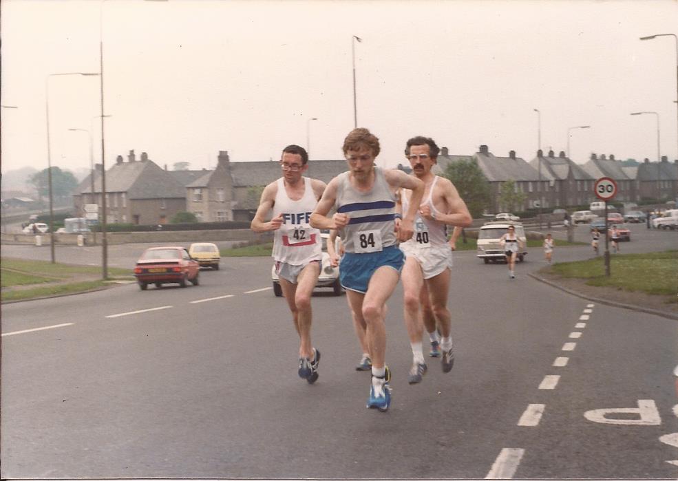 Youngson leading Macgregor and Macfarlane; Gerry Gaffney in the background